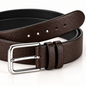Dark brown textured formal belt in an angled close-up, highlighting a silver-tone rectangular pin buckle, twin keeper loops and round strap holes.