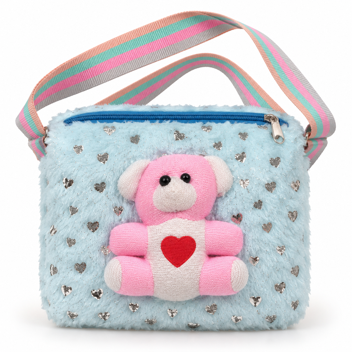 Front view of a light blue fuzzy shoulder bag with silver heart motifs, a pink teddy bear with a red heart, blue zipper and pastel striped strap.
