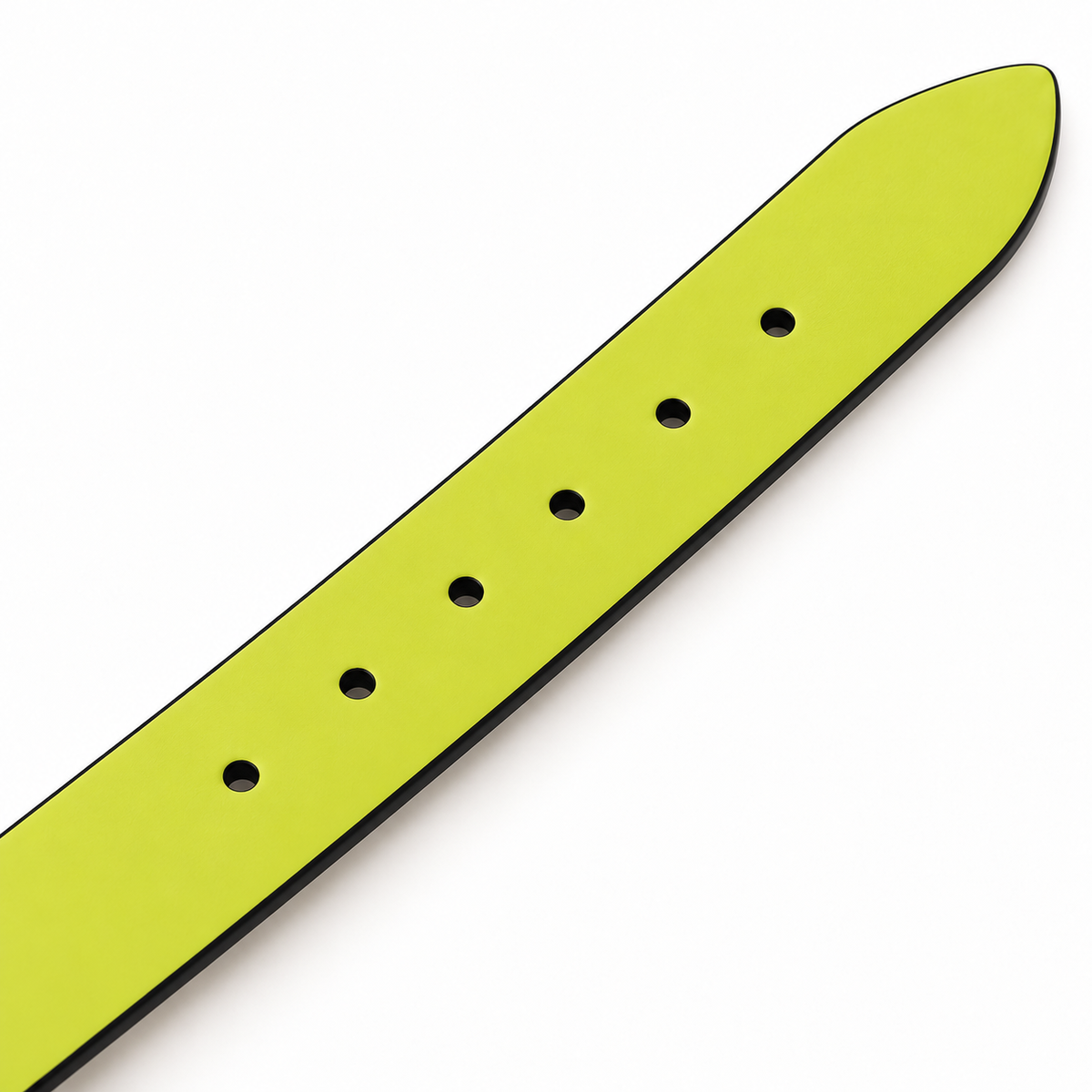 Diagonal close-up of a neon yellow belt tip, showing a plain fine-textured surface, black edges, rounded pointed end and a row of round adjustment holes.
