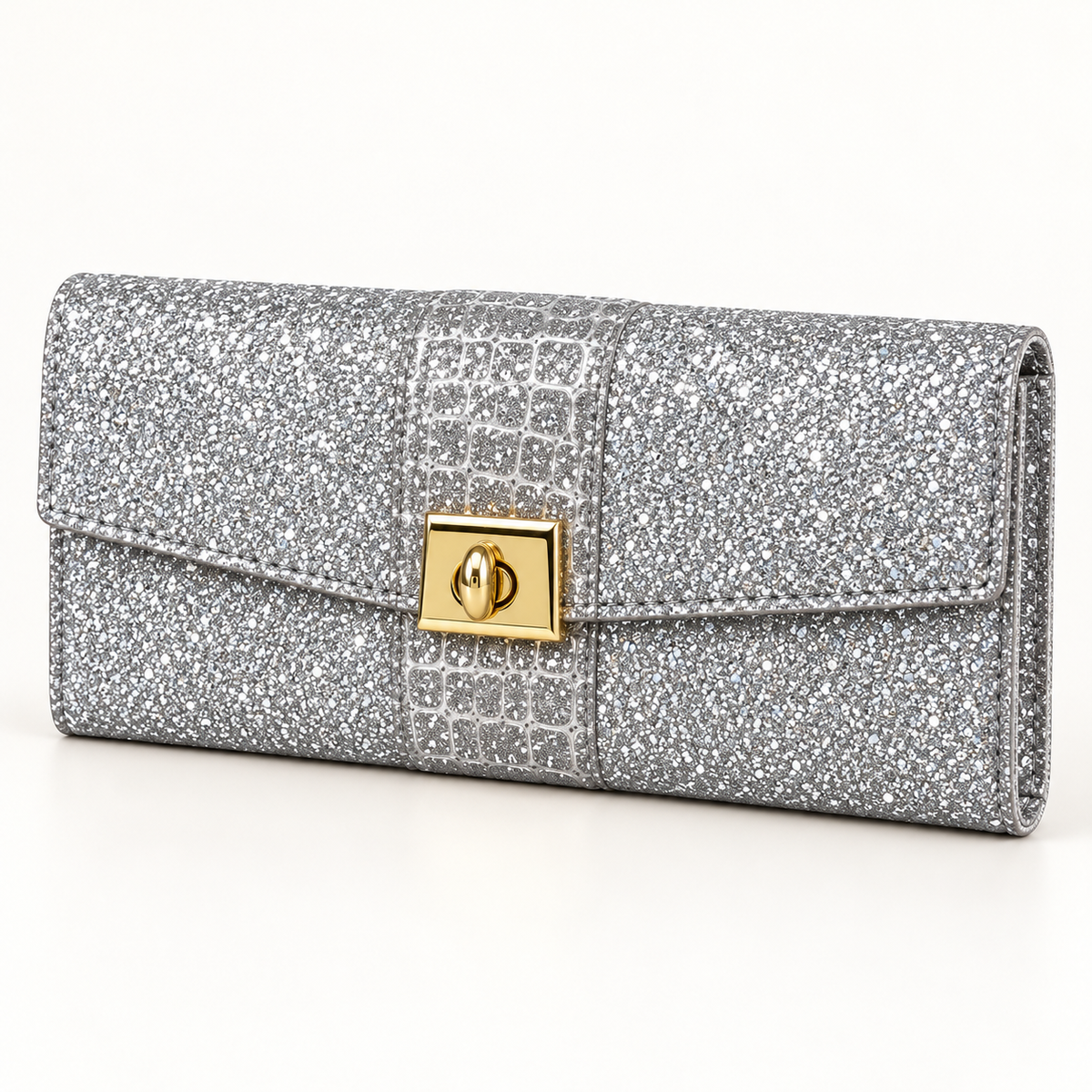 Silver glitter clutch in three-quarter view, showing a slim folded side profile, stitched flap, embossed scale-pattern band and gold-tone turn-lock clasp.