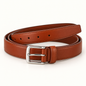 Tan belt shown coiled at an angle with stitched edges, round adjustment holes, a matching keeper loop and a polished silver-tone rectangular pin buckle.