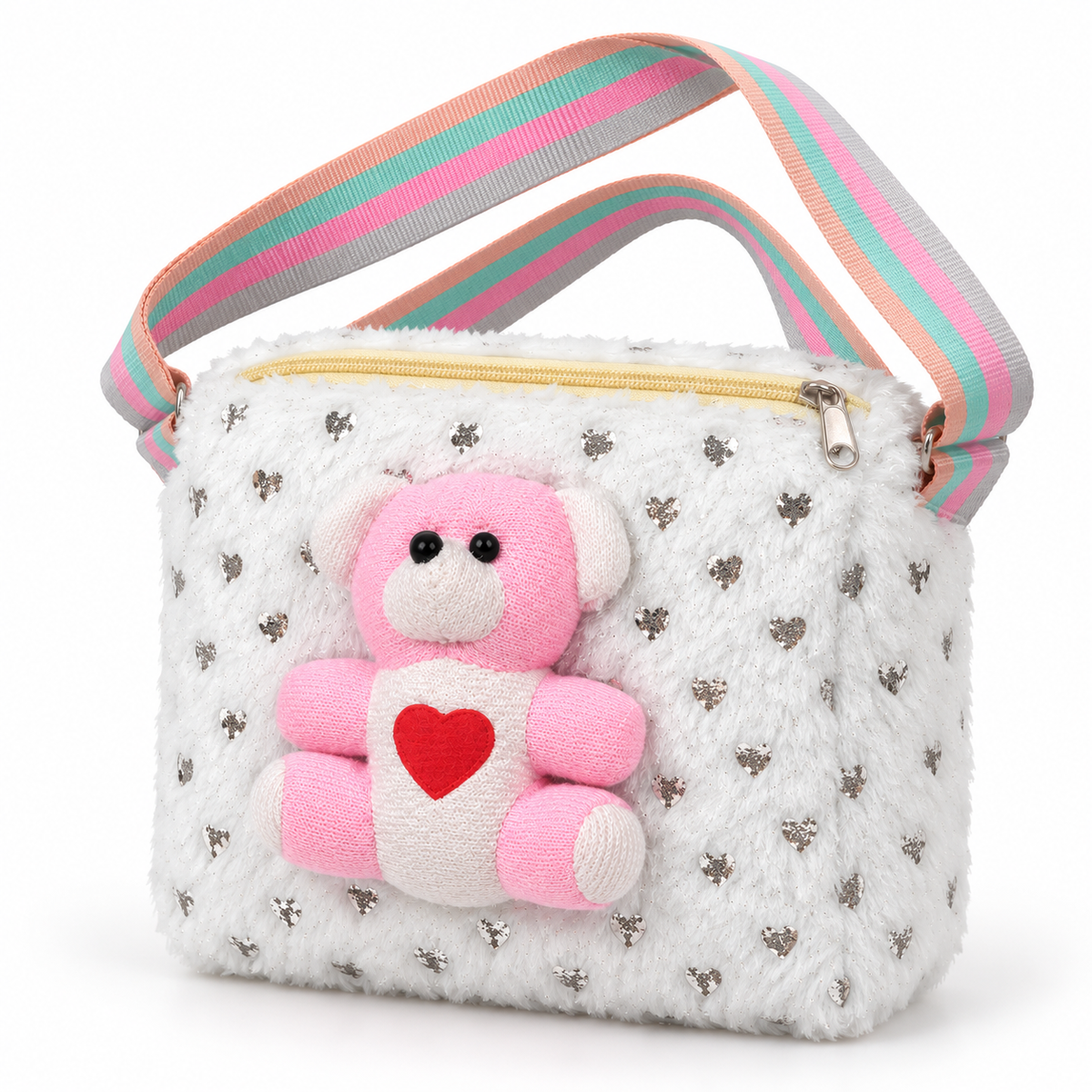 White shoulder bag shown at an angle with a fluffy texture, silver heart pattern, raised pink teddy bear with a red heart and pastel striped strap.