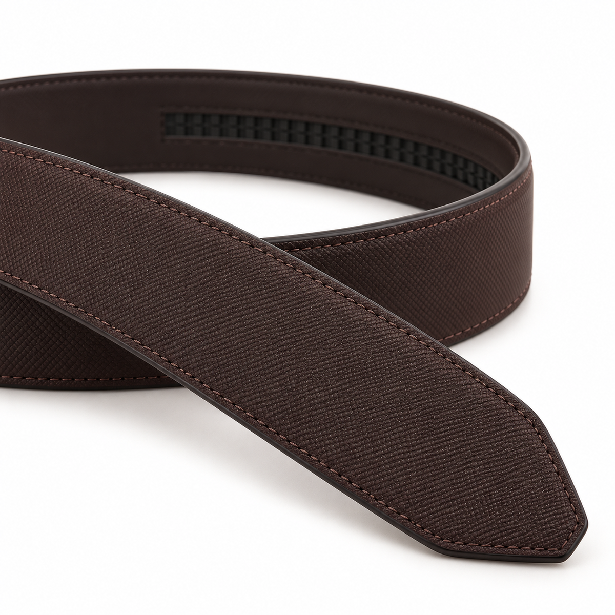 Close-up of the dark-brown strap's fine texture, clean edge and tapered tip.