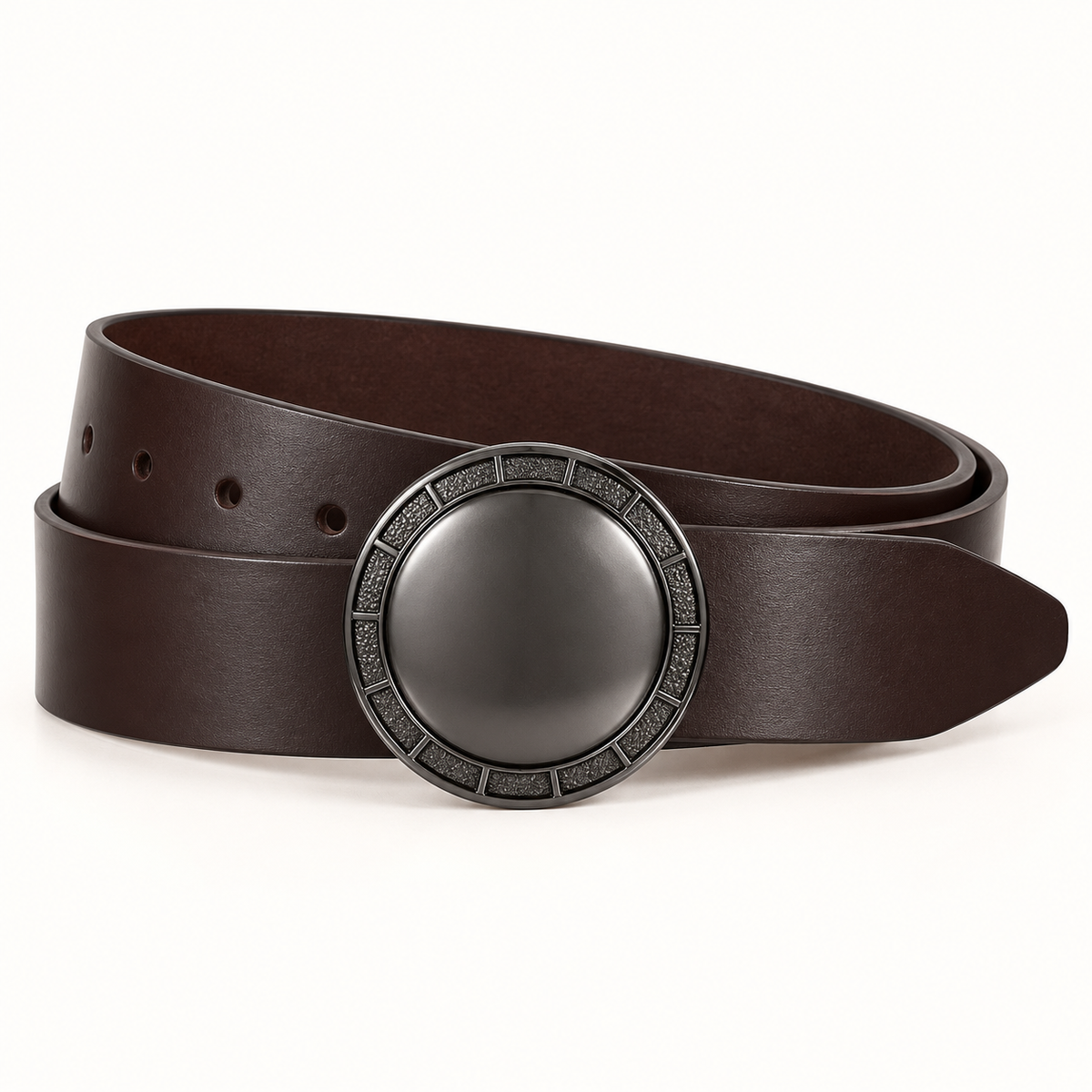 Round gunmetal-tone statement buckle with a plain centre and segmented rim on a dark brown belt.